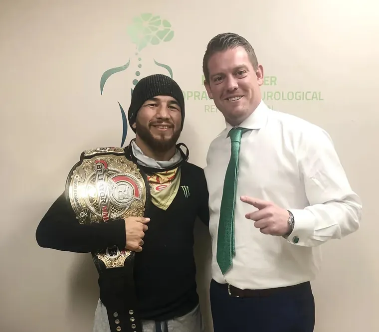 Juan Archuleta with Dr. Jeff McWhorter, D.C.
