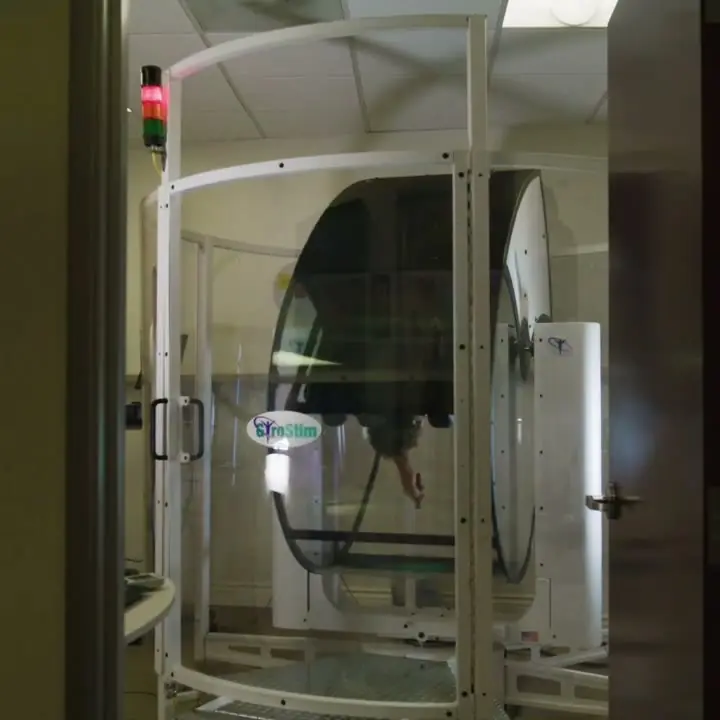 The GyroStim ring rotating a patient through several axes