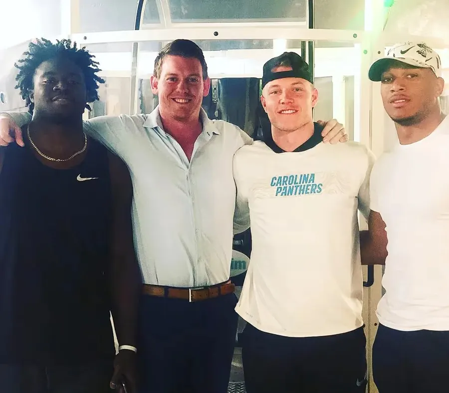 Christian McCaffrey and DJ Moore with Dr. Jeff McWhorter, D.C. at True Performance