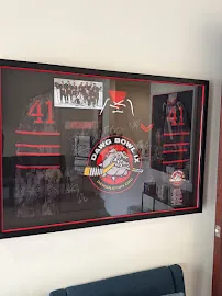 A charity hockey tournament plaque on the clinic wall